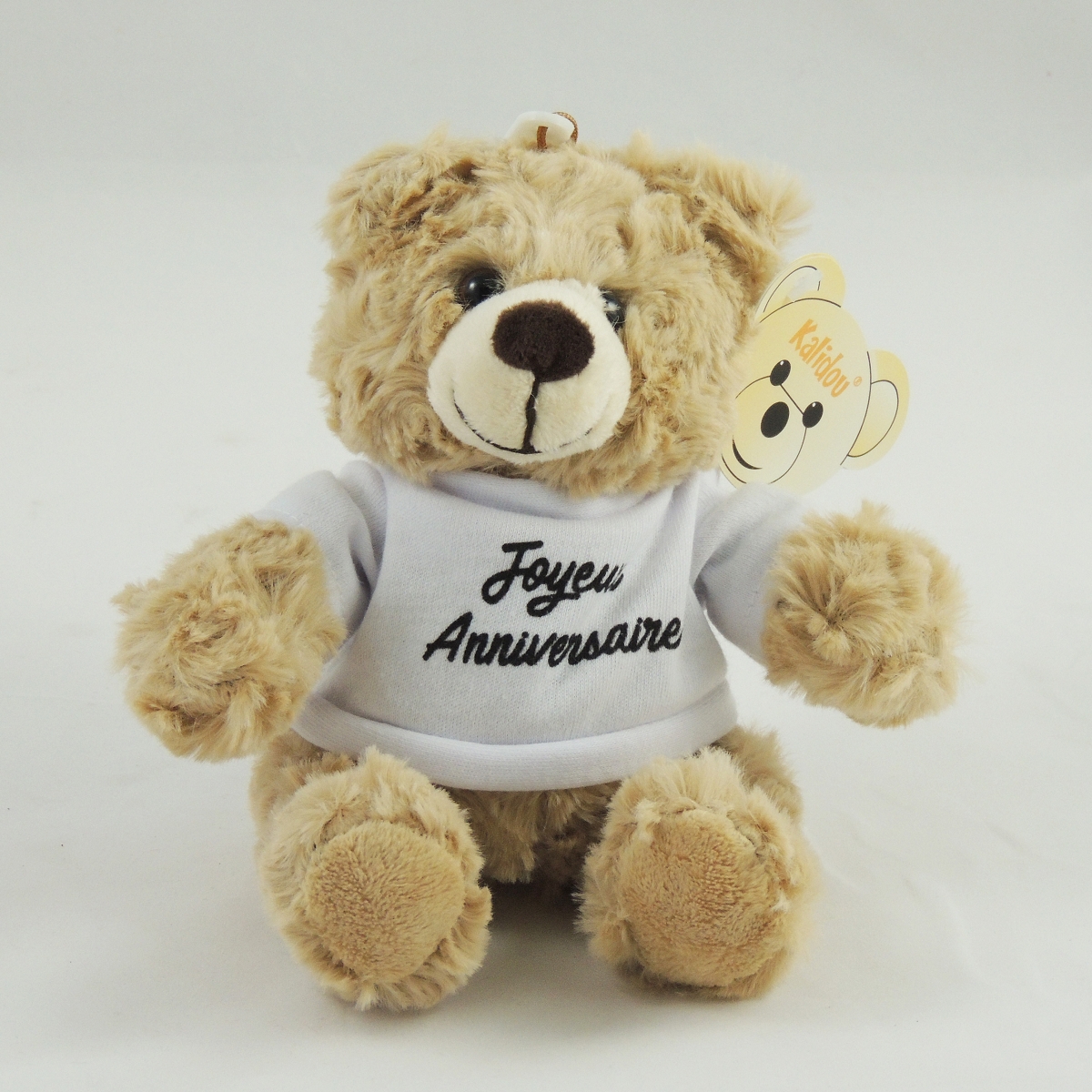 Peluche ours beige t-shirt blanc "joyeux anniversaire"